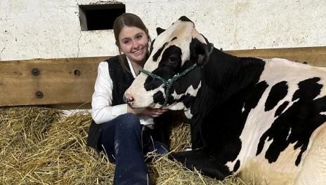 Keyahna Musland with dairy cow